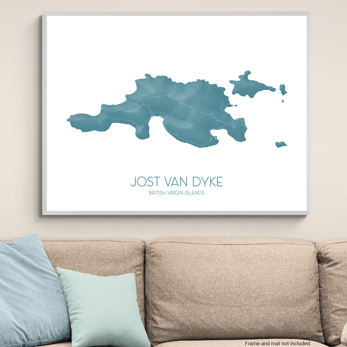 Framed map of Jost Van Dyke on a wall above a beige sofa with light blue pillows.