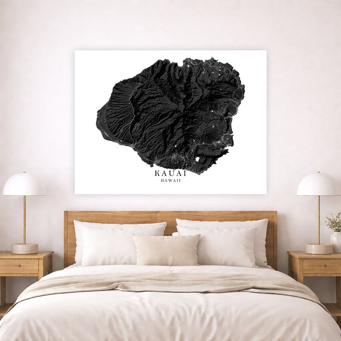 Black Kauai art print on a wall above a bed in a bedroom setting