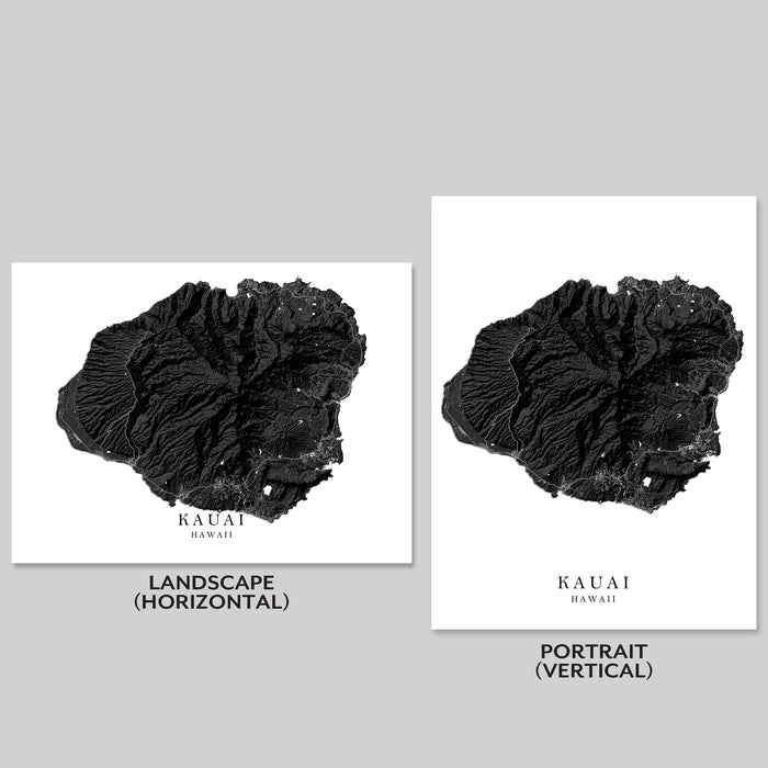 Two black and white posters of Kauai, Hawaii, one landscape and one portrait orientation, on a gray background.