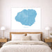 Bedroom with a map of Kauai on the wall above a bed.