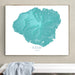 Framed map of Kauai, Hawaii on a wall above a white bench.
