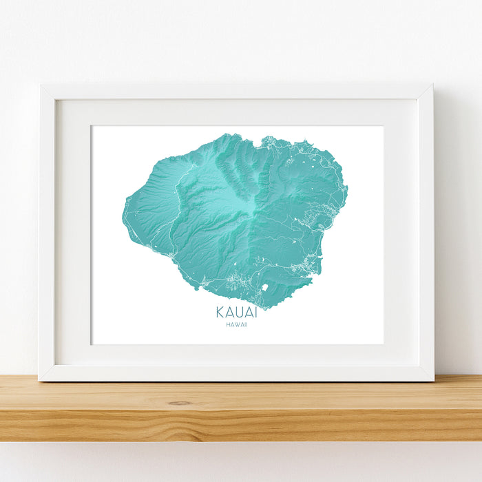 Framed map of Kauai, Hawaii on a white wall