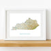 Framed map of Kentucky on a white wall