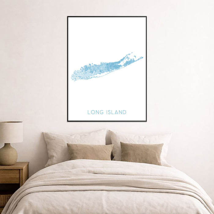 Framed map of Long Island above a bed in a bedroom