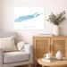 Living room with a gray sofa, wooden cabinet, and a framed map of Long Island on the wall.