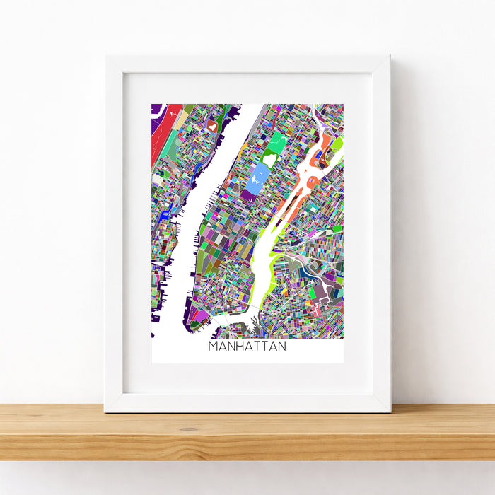 Framed colorful map of Manhattan on a white wall
