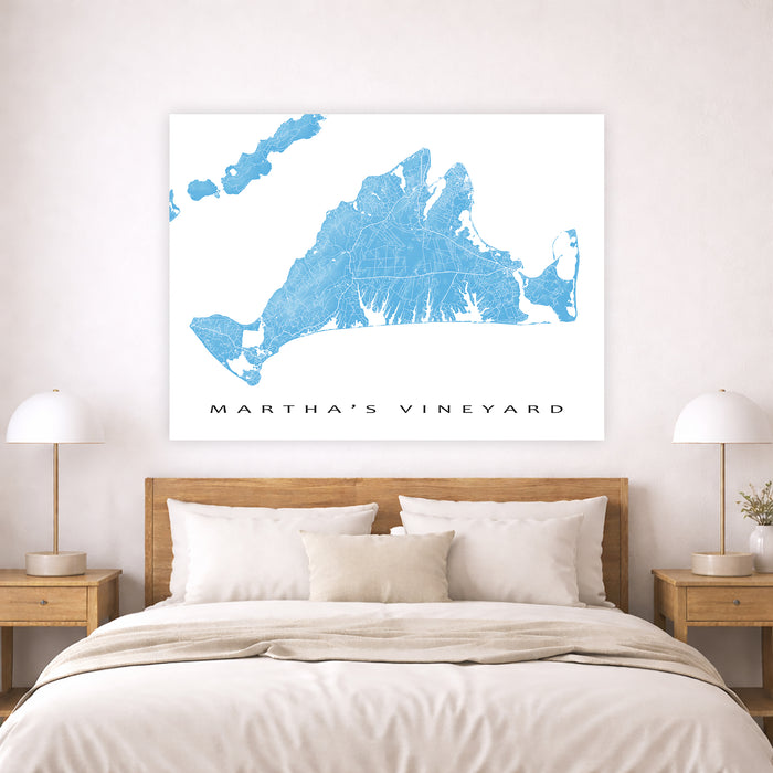 Bedroom with a map of Martha's Vineyard on the wall above a bed.