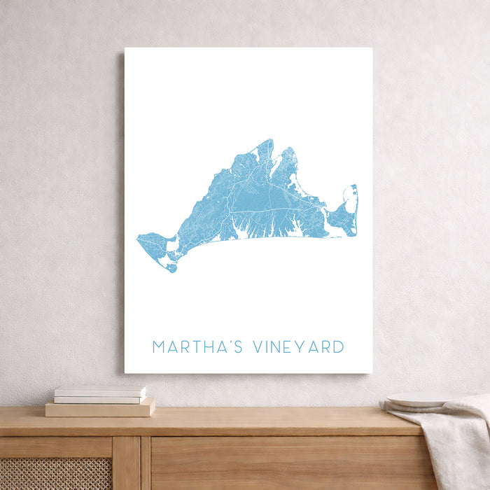 Map of Martha's Vineyard on a white wall above a wooden surface