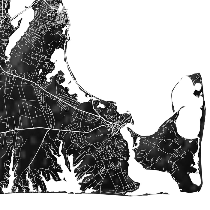 Black and white map of a coastal area with roads and boundaries.
