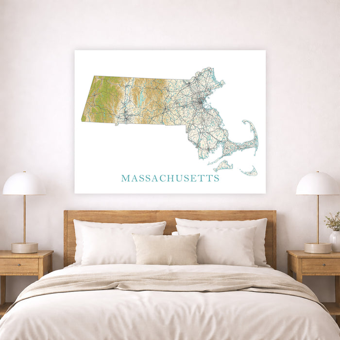 Map of Massachusetts on a wall above a bed in a bedroom setting
