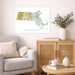 Living room with a gray sofa, wooden cabinet, and Massachusetts map print on the wall.