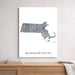 Map of Massachusetts on a white background above a wooden surface.