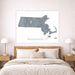 Map of Massachusetts on a wall above a bed in a bedroom setting