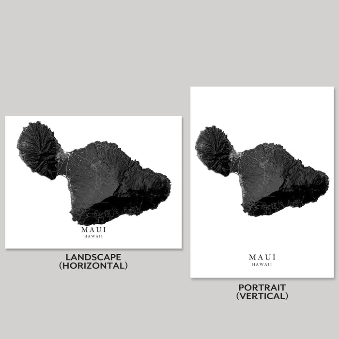 Two black and white posters of Maui, Hawaii, one landscape and one portrait orientation, on a gray background.