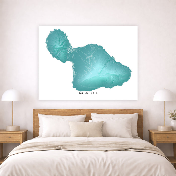 Framed map of Maui on a wall above a bed with wooden headboard and nightstands.