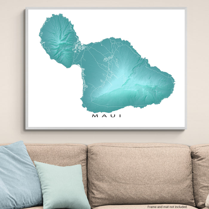 Framed map of Maui on a wall above a beige sofa with light blue pillows.