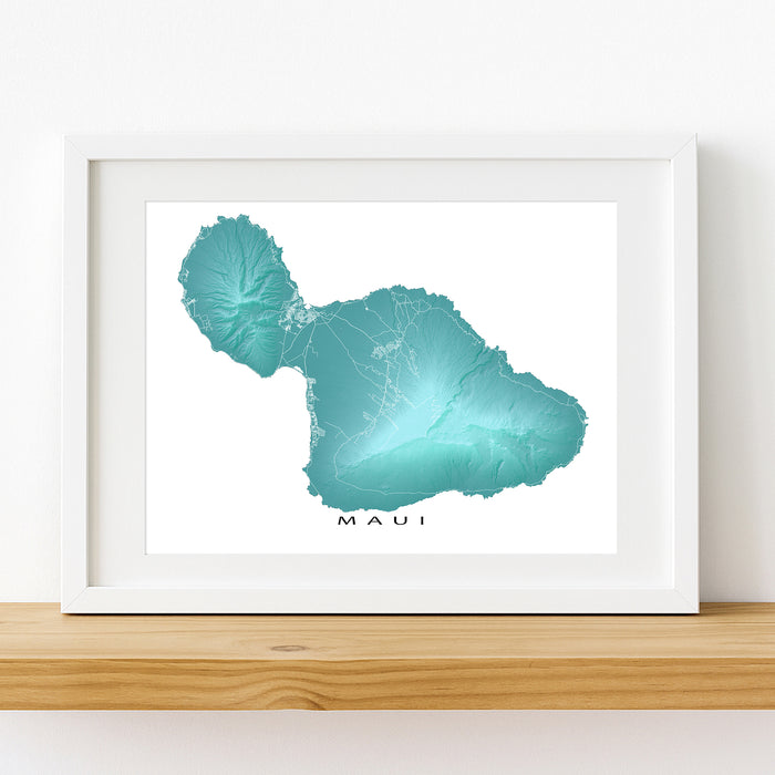 Framed artwork of a teal map of Maui on a white background
