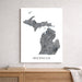 Map of Michigan on a white wall above a wooden shelf.