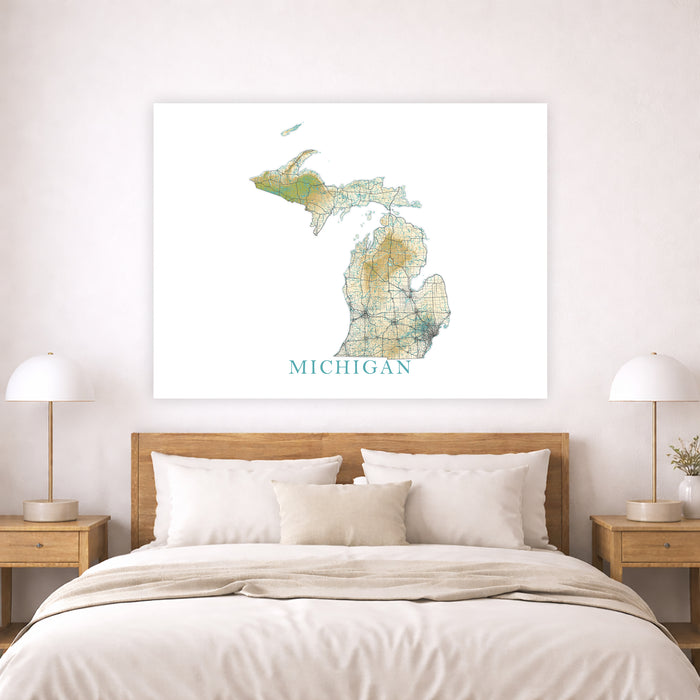 Map of Michigan on a wall above a bed in a bedroom setting
