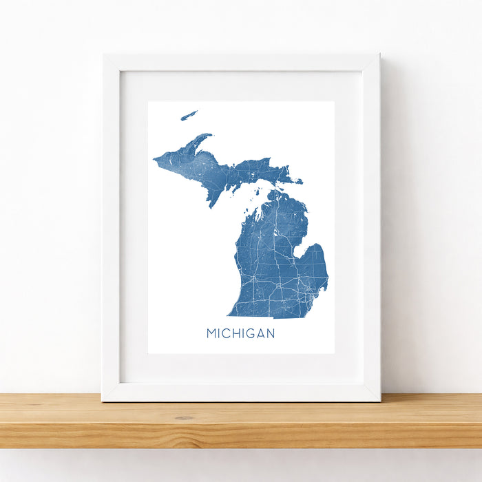 Framed map of Michigan on a white wall