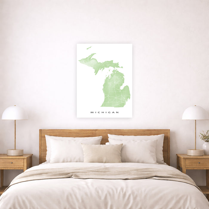 Bedroom with a wooden headboard and 'Michigan' map poster on the wall.