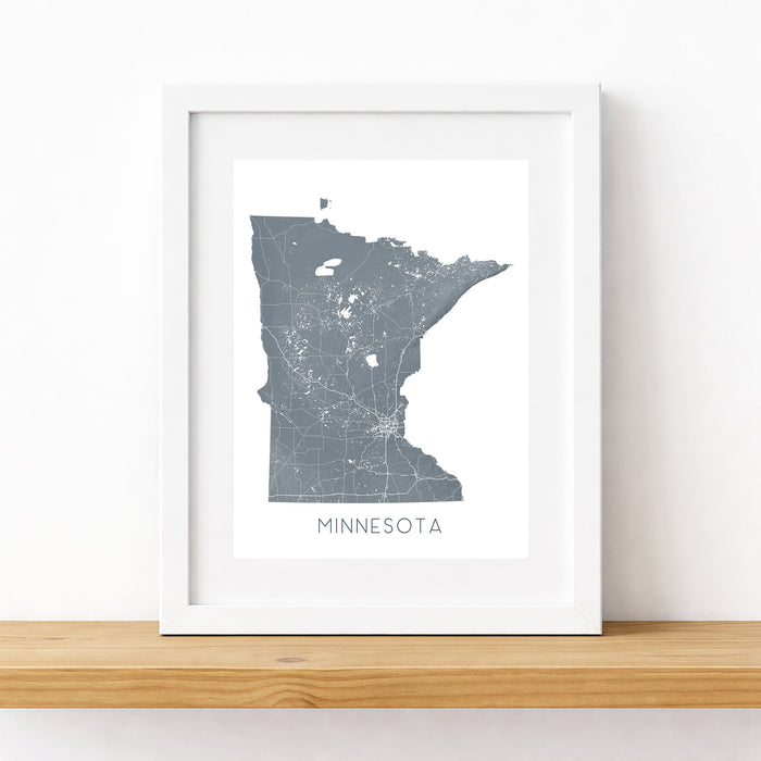 Framed map of Minnesota on a white wall