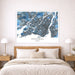 Map of Montreal framed on a wall above a bed