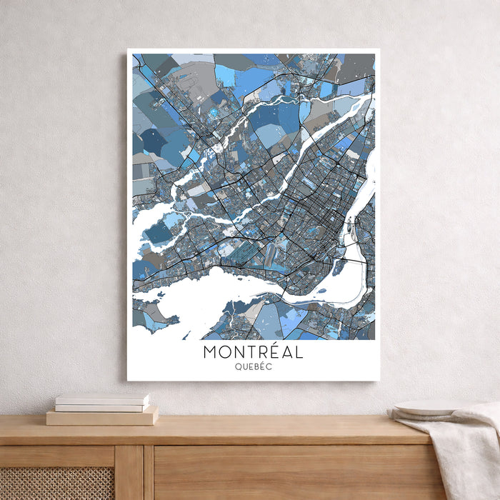 Framed map of Montreal, Quebec on a wall above a wooden surface.