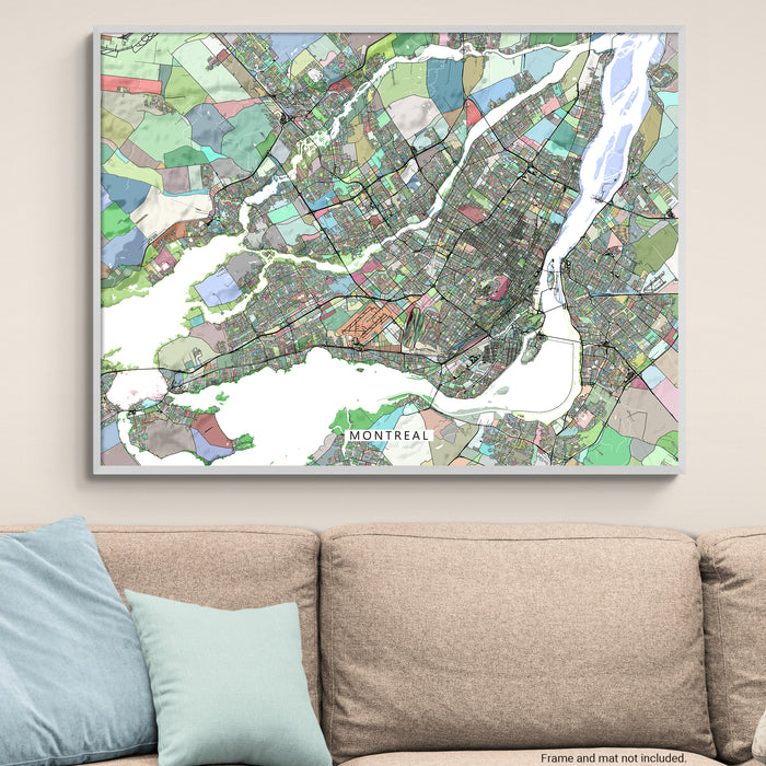 Colorful map of Montreal on a wall above a beige sofa with light blue pillows.