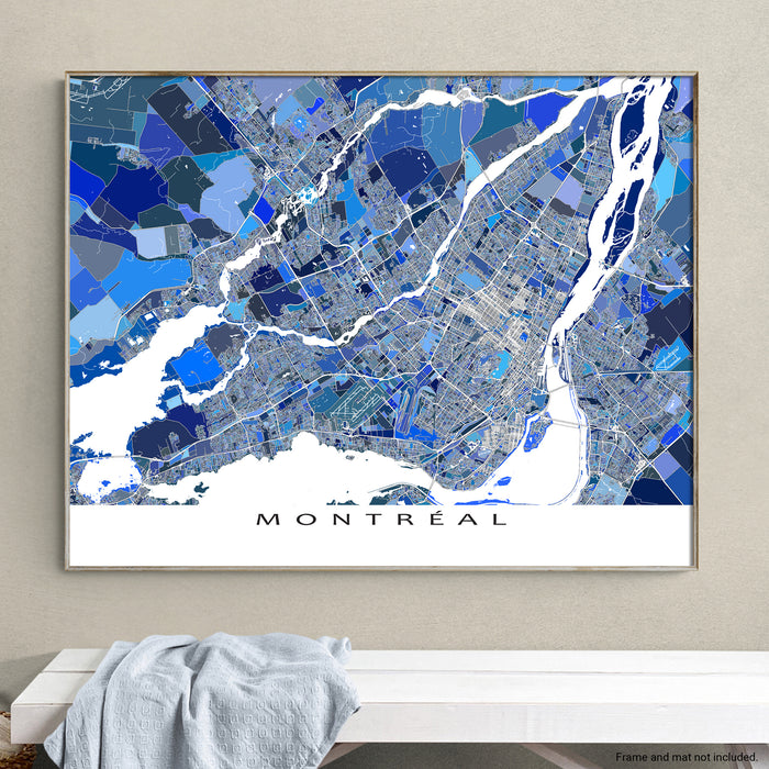 Framed map of Montreal on a wall above a white bench.