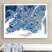 Framed map of Montreal on a wall above a white bench.
