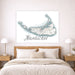 Map of Nantucket on a wall above a bed in a bedroom setting