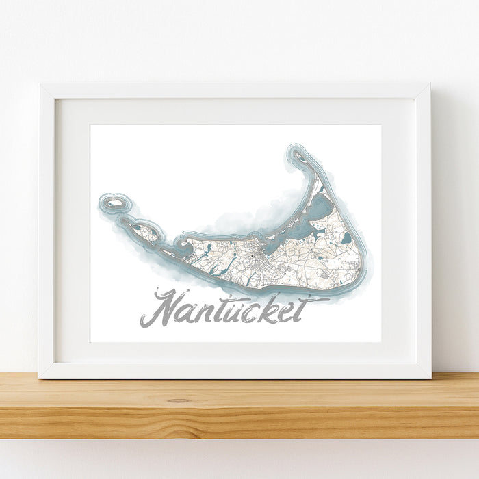 Framed map of Nantucket with a white border on a wooden surface.