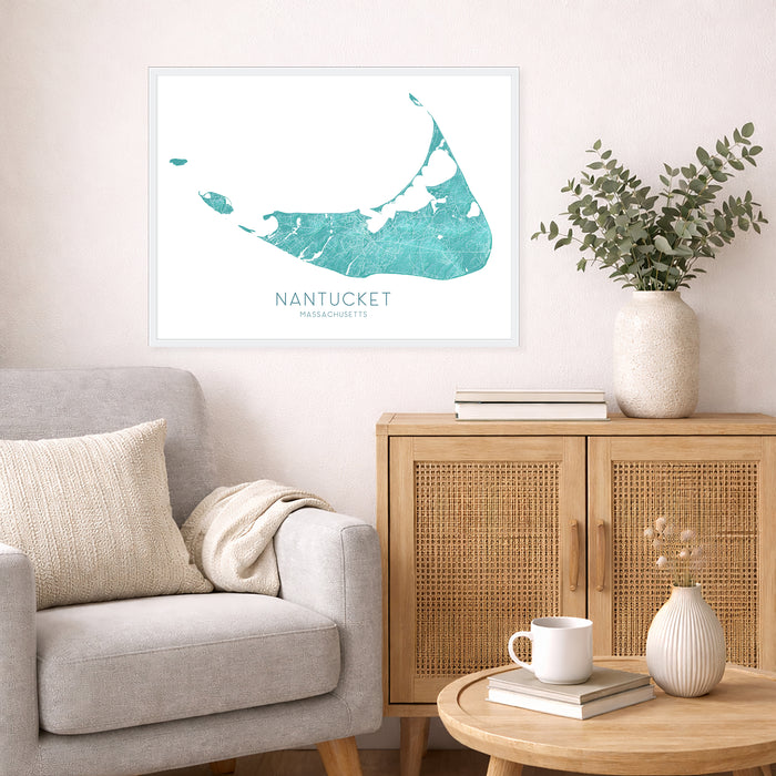 Living room with a gray sofa, wooden cabinet, and Nantucket map print on the wall.