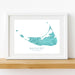 Framed map of Nantucket, Massachusetts on a white wall.