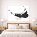 Map of Nantucket, Massachusetts on a wall above a bed in a bedroom.