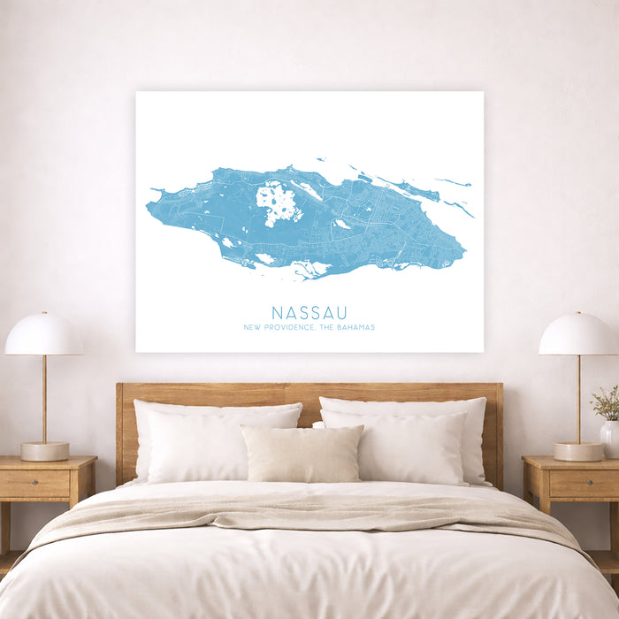 Bedroom with a map of Nassau on the wall above a bed.