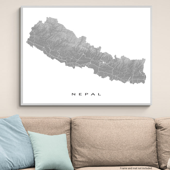 Framed map of Nepal on a wall above a sofa
