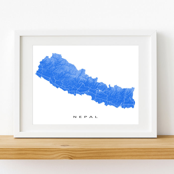 Framed map of Nepal on a white wall