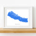 Framed map of Nepal on a white wall