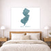 Map of New Jersey on a wall above a bed in a bedroom