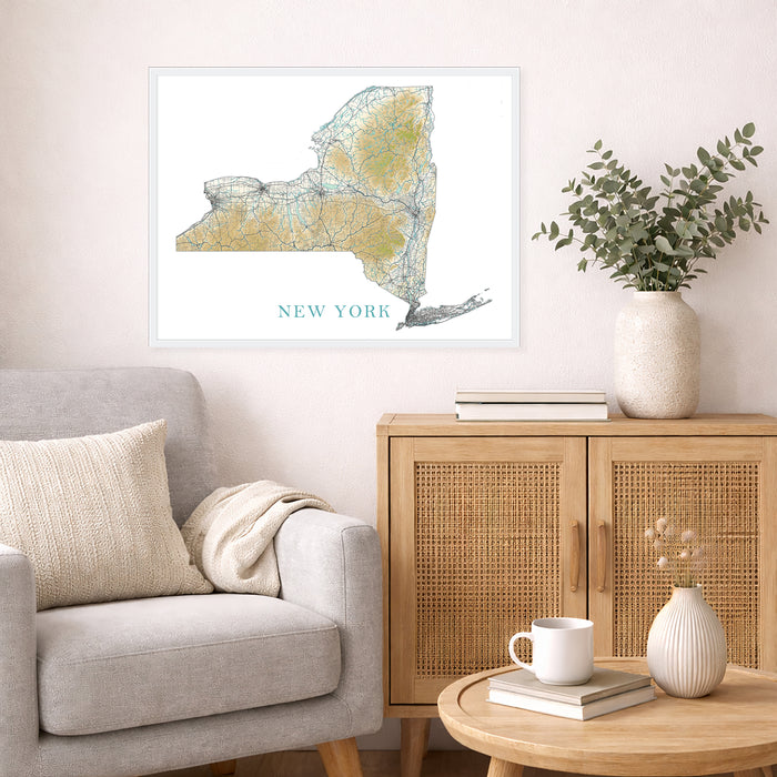 Living room with a map of New York, a vase with plants, and a wooden cabinet.