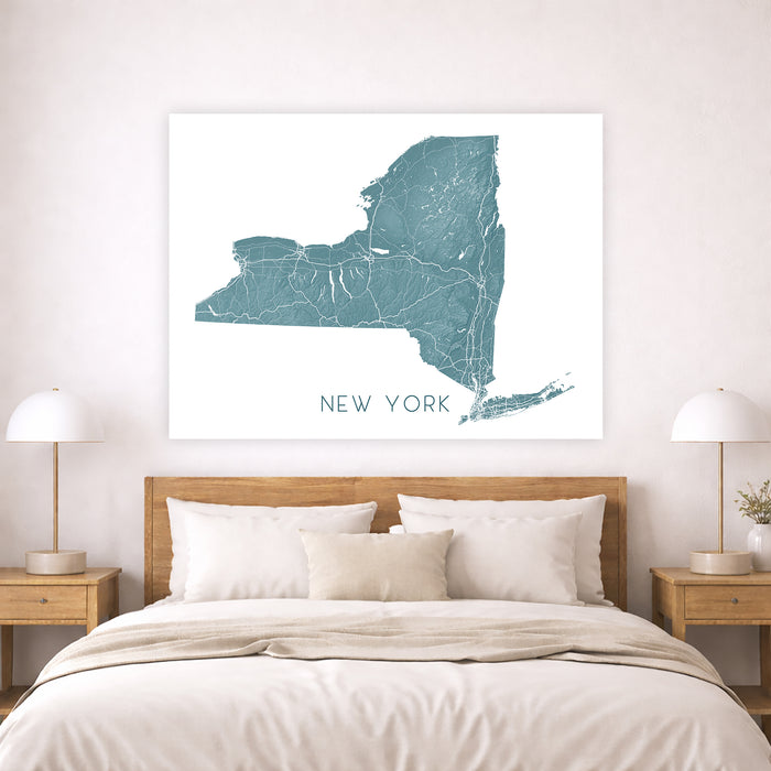 Map of New York on a wall above a bed in a bedroom