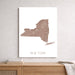 Map of New York on a white wall above a wooden shelf.