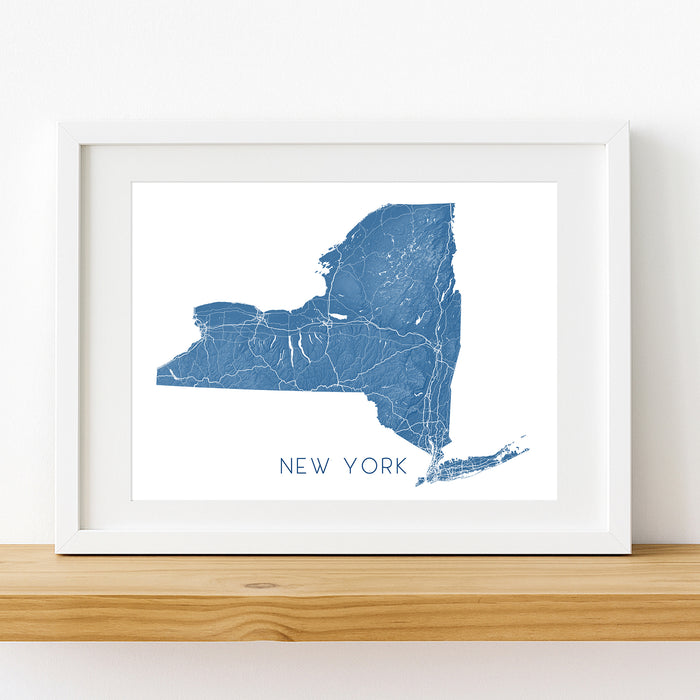Framed map of New York on a white wall