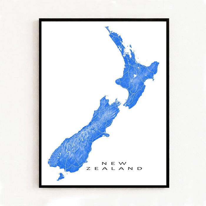 Framed map of New Zealand on a white wall