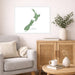 Living room with a map of New Zealand on the wall, a vase with plants, and a wooden cabinet.