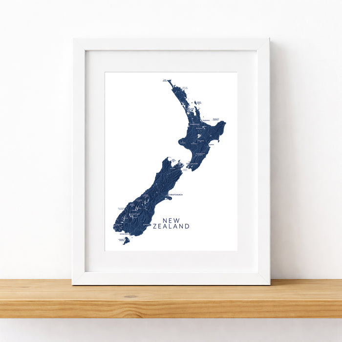 Framed map of New Zealand on a white background