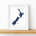 Framed map of New Zealand on a white background