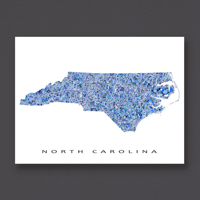 Map of North Carolina with a blue and white design on a dark gray background